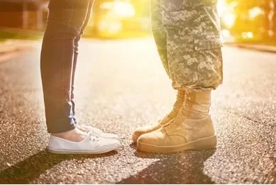 military couple, boots, sunset